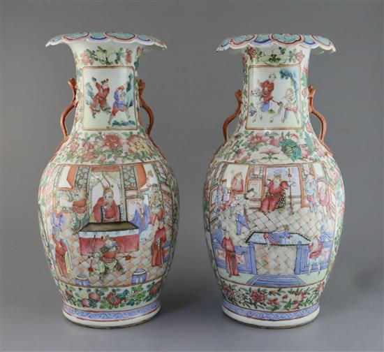 A pair of Chinese famille rose vases, 19th century, H. 45cm, one with section of rim lacking